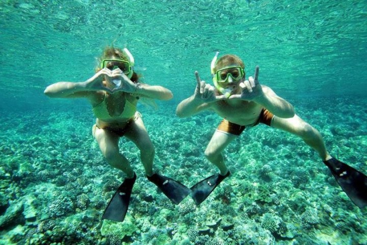 a woman swimming in the water