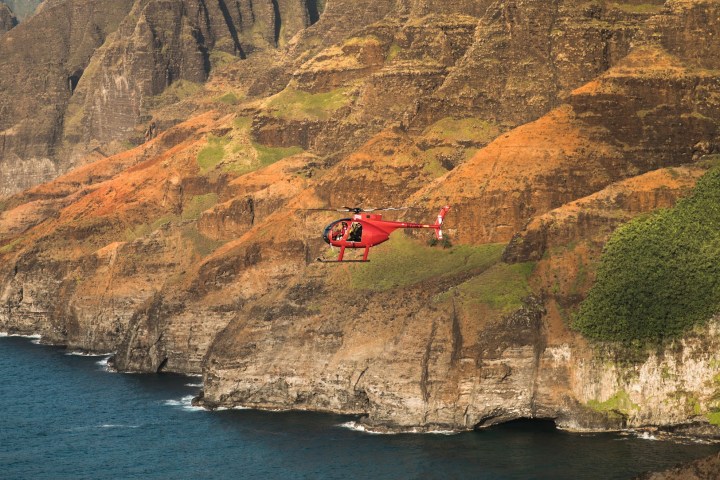 a body of water with a mountain in the background