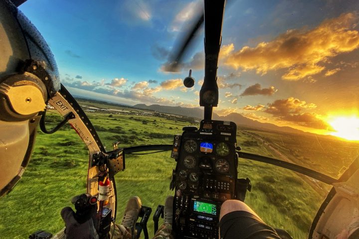 a group of people riding on the back of a pickup truck