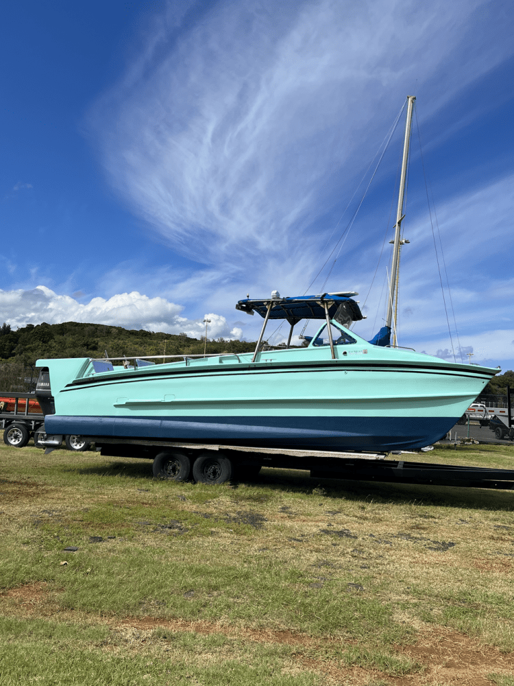 a boat parked next to a body of water