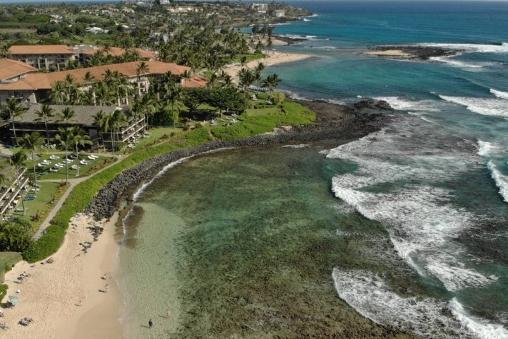 a view of a beach next to a body of water