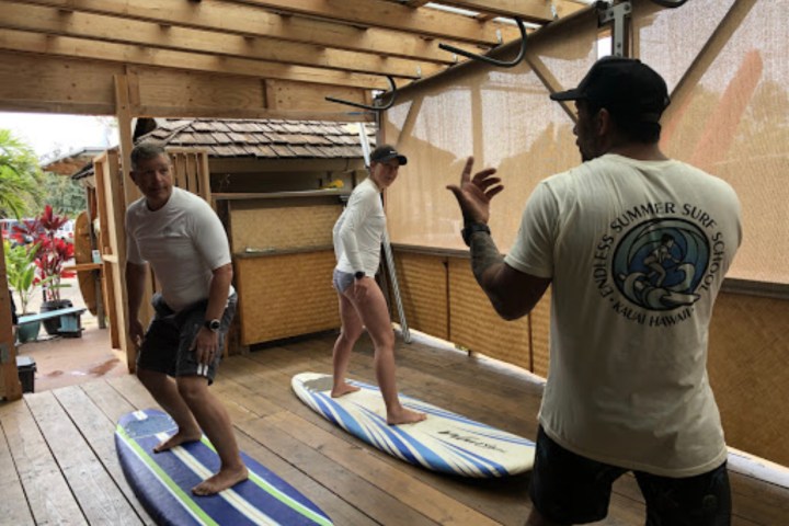 a group of people standing in a room