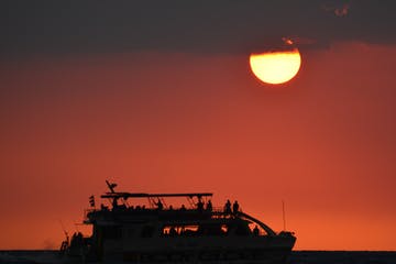 a sunset over a body of water