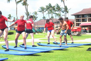 a group of people playing a game of frisbee