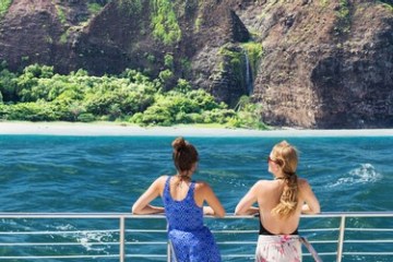 a person standing in front of water