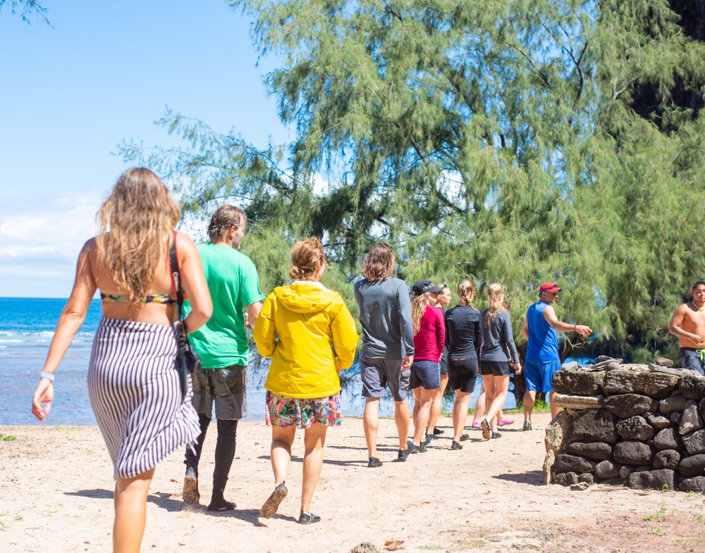 a group of people on a beach