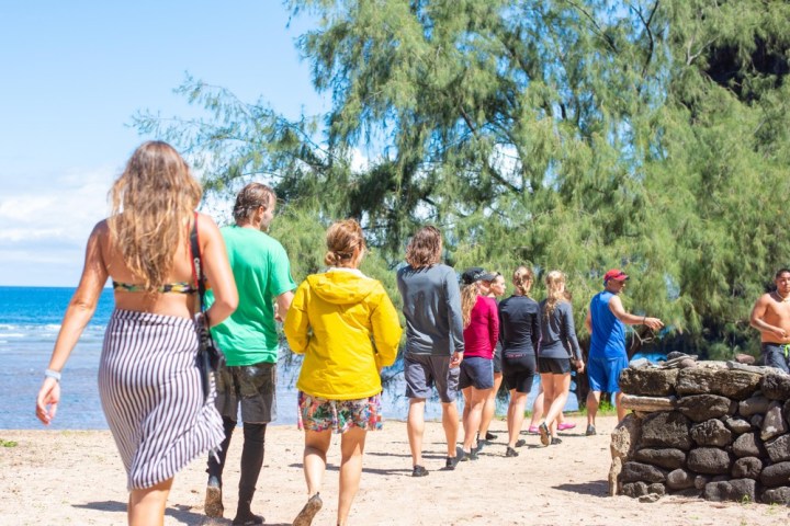 a group of people on a beach