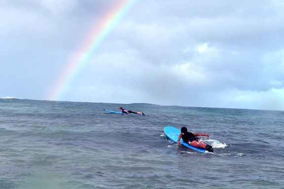 a rainbow over a body of water