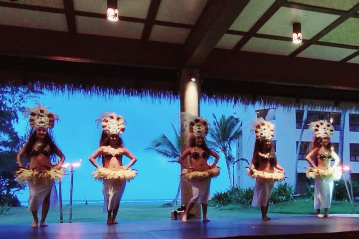 a group of people standing in a room