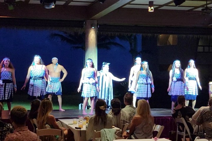 a group of people sitting at a table