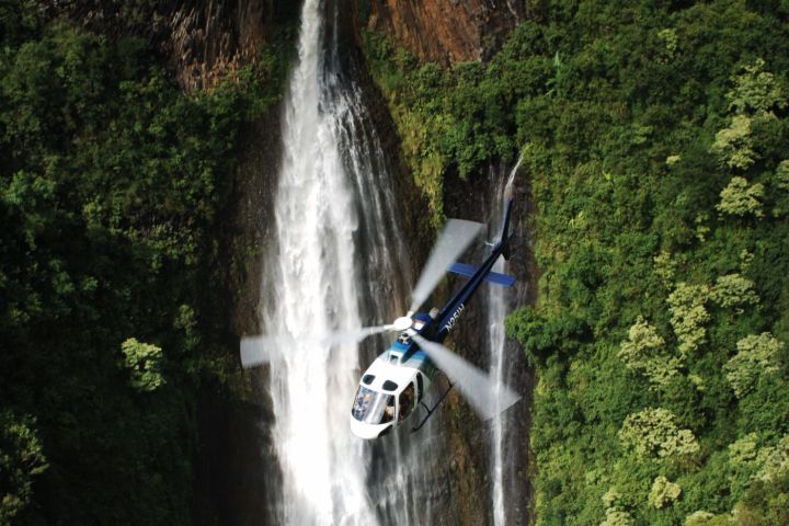 a waterfall in a forest