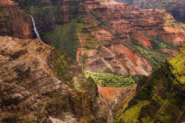 a canyon with Waimea Canyon State Park in the background