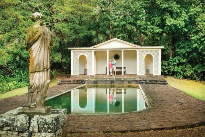 a house with trees in the background