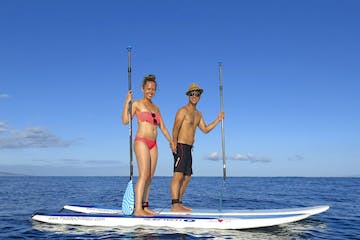 a person riding a surfboard in the water