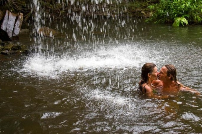a group of people swimming in a body of water