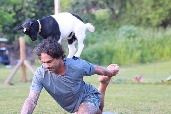 a man playing a game of frisbee