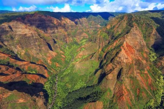 a canyon with a mountain in the background