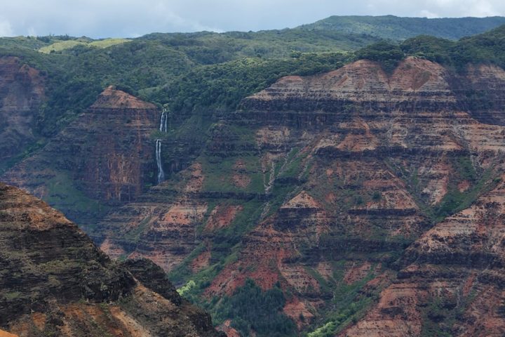 a canyon with Waimea Canyon State Park in the background