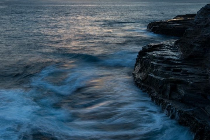 a sunset over a body of water