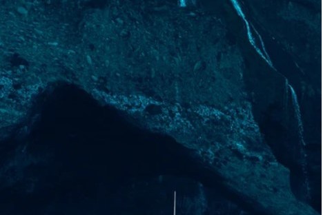 a small boat in a body of water