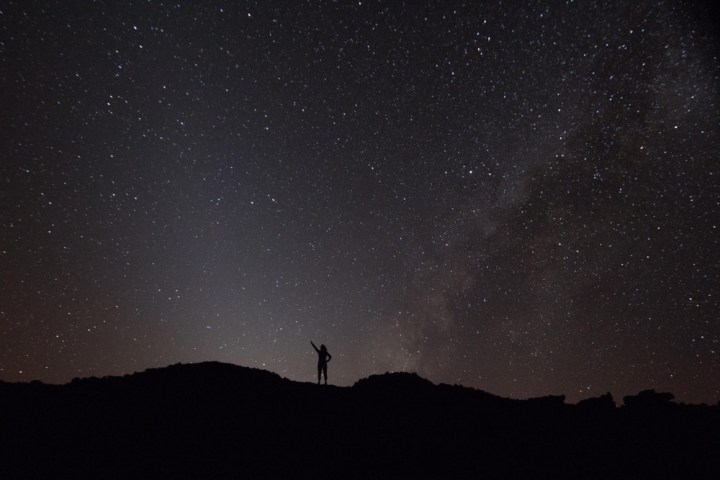 a person in a dark sky