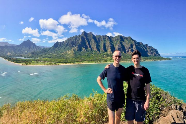 a person standing in front of a body of water