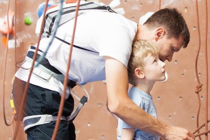 a person holding a child