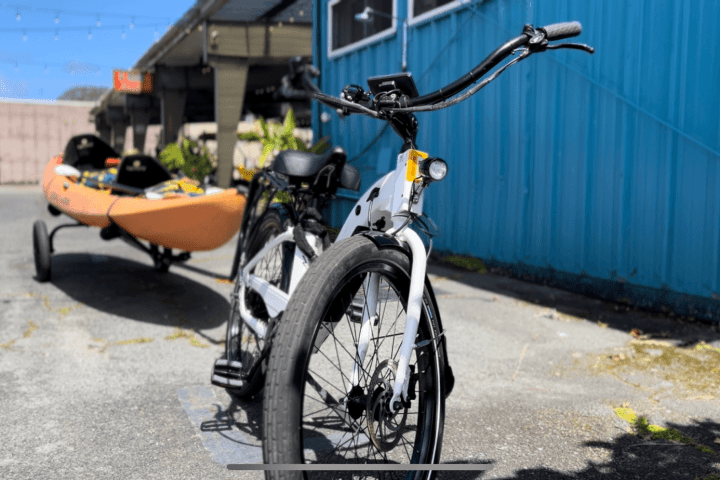 a bicycle parked on the side of a building