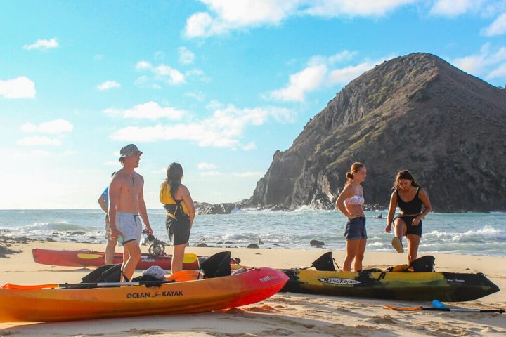 a group of people on a beach