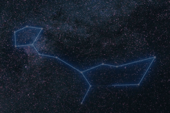 Night sky constellation outlined in blue against a starry background.